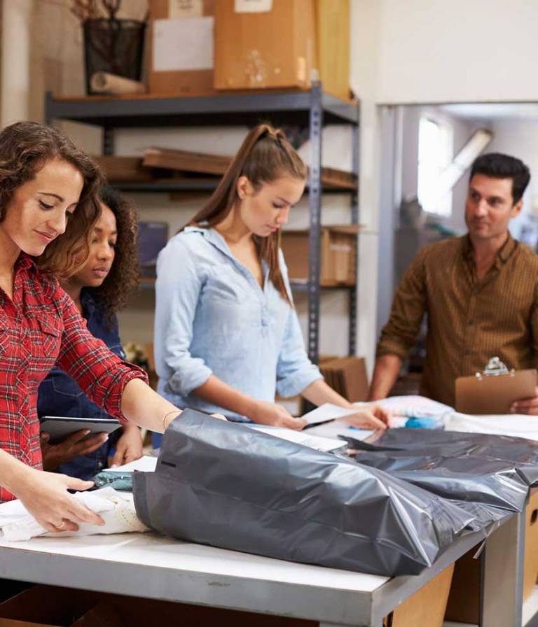 Young People working on packaging