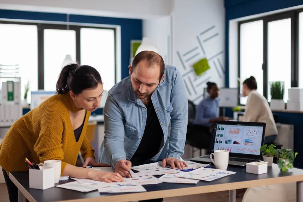 Two web designers discussing web design