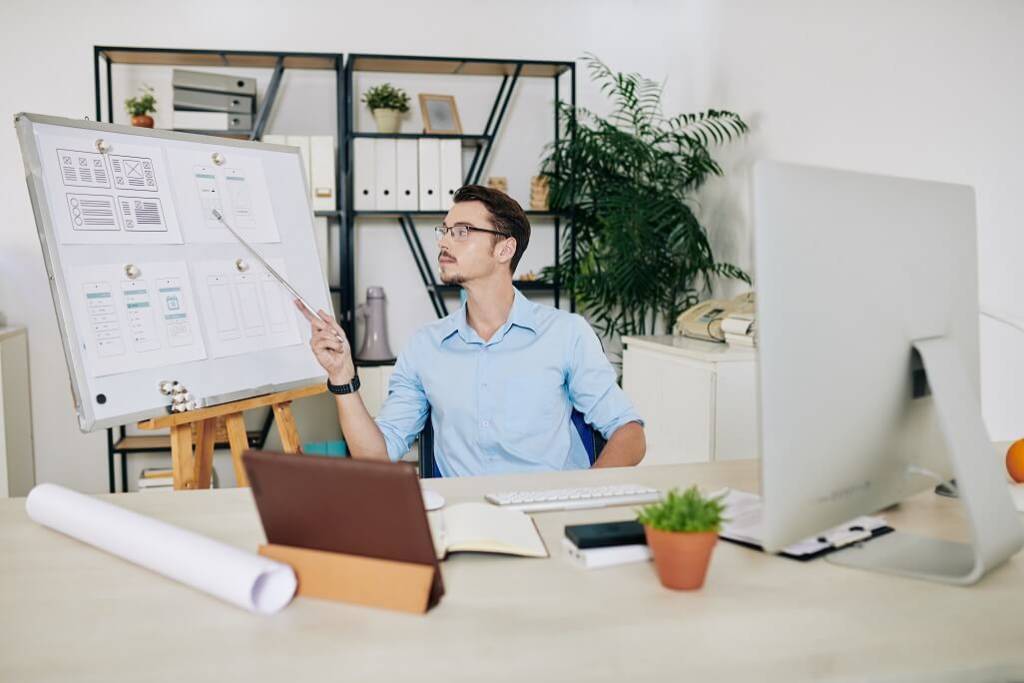 A web professional working in his office