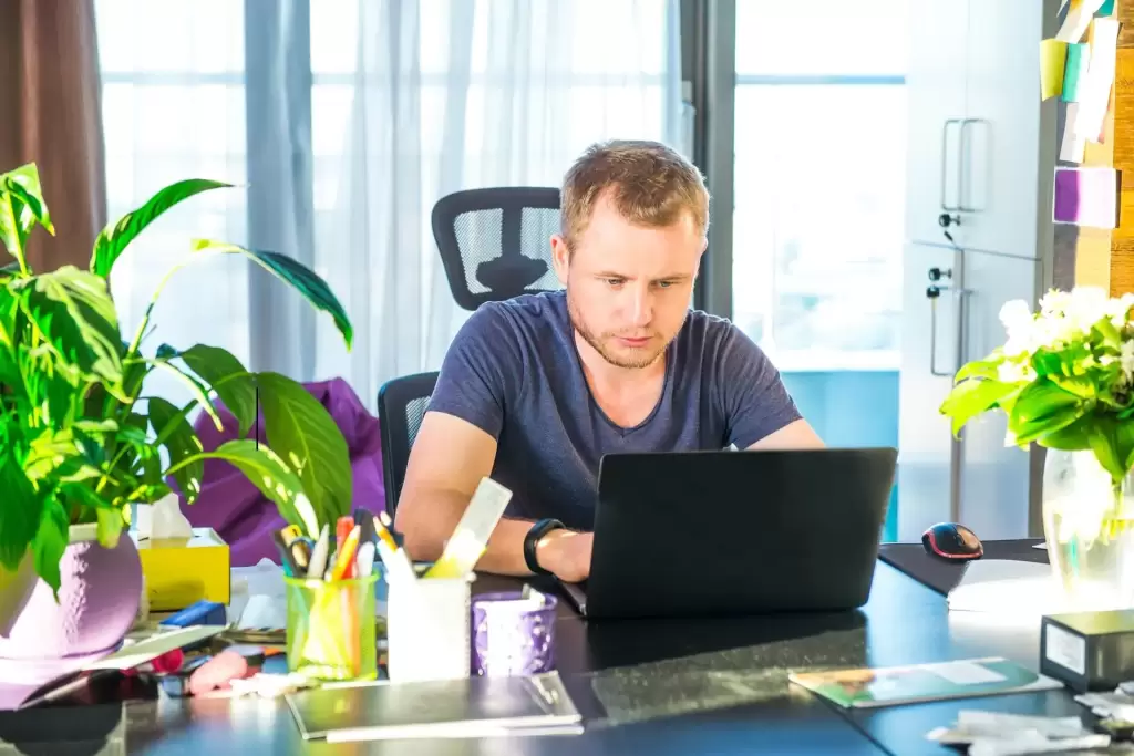 a person working with his PC